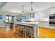 Well-appointed kitchen featuring an island with seating, stainless appliances, and eat-in breakfast area at 2363 Palmer Creek Bnd, Charleston, SC 29412