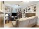 Comfortable living room with a large sofa and mounted deer heads at 2703 Phyllis St, North Charleston, SC 29405
