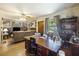 Open living space with an office area, comfortable seating, and vintage decor for a lived-in feel at 2703 Phyllis St, North Charleston, SC 29405