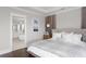 Main bedroom features a king bed, bedside tables, and a view into the main bathroom at 2917 River Vista Way, Mount Pleasant, SC 29466
