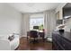 Charming home office with a traditional desk, modern decor, and a serene view from the bright window at 2917 River Vista Way, Mount Pleasant, SC 29466