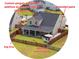 Aerial view of a backyard featuring a custom pergola, extended patio, and a dog area at 302 Lucca Dr, Summerville, SC 29486