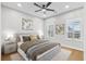 Calming bedroom with neutral tones, soft lighting, and view of the outdoors at 302 Lucca Dr, Summerville, SC 29486