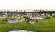 Aerial view of the community showcasing the pool, playground, firepit, and surrounding homes at 302 Lucca Dr, Summerville, SC 29486
