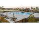 Relaxing community pool with plenty of seating and lounge chairs, perfect for soaking up the sun at 302 Lucca Dr, Summerville, SC 29486