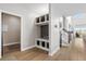 Inviting entryway features built-in storage, coat hooks, and bench seating in neutral tones at 302 Lucca Dr, Summerville, SC 29486