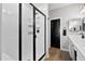 Elegant shower featuring glass enclosure and black hardware, complemented by a modern vanity at 302 Lucca Dr, Summerville, SC 29486