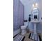 Stylish powder room with pedestal sink, modern fixtures and decor creating an inviting space at 3025 Rampart Rd, Summerville, SC 29483
