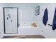 Bathroom with tiled shower, soaking tub, and elegant fixtures at 3025 Rampart Rd, Summerville, SC 29483