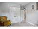 Bright bedroom with gray walls, plush carpet, closet, and doorways that let in plenty of light at 3025 Rampart Rd, Summerville, SC 29483