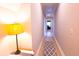 Bright hallway with a light wood floor, leading to rooms with light walls, creating a welcoming transition at 3025 Rampart Rd, Summerville, SC 29483