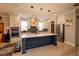 Bright, modern kitchen with an island, stainless steel appliances, and pendant lighting at 3025 Rampart Rd, Summerville, SC 29483
