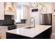 Modern kitchen featuring a large island, stainless steel appliances, and pendant lighting at 3025 Rampart Rd, Summerville, SC 29483