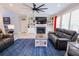 Comfortable living room with fireplace, built-in shelving, and modern furnishings at 3025 Rampart Rd, Summerville, SC 29483