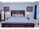 Spacious bedroom features large bed, neutral carpet, and elegant furnishings at 3025 Rampart Rd, Summerville, SC 29483