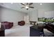 Spacious office with desk, ceiling fan, comfortable chairs, and doors to other rooms at 3025 Rampart Rd, Summerville, SC 29483