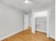 Bedroom featuring hardwood floors, a ceiling fan, and a walk-in closet; perfect for comfortable living at 31 Lyttleton St, Charleston, SC 29407
