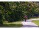 A Personal bikes on a park path surrounded by nature at 31 Lyttleton St, Charleston, SC 29407