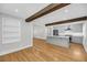 Modern kitchen with gray cabinets, stainless steel appliances, hardwood floors, and an open design at 31 Lyttleton St, Charleston, SC 29407