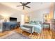 Comfortable bedroom with hardwood floors, natural light, neutral decor, and cozy furniture at 312 Hobcaw Dr, Mount Pleasant, SC 29464