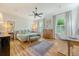 Tranquil main bedroom offers hardwood floors, natural light, and neutral decor, perfect for relaxation at 312 Hobcaw Dr, Mount Pleasant, SC 29464