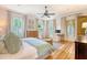 Serene bedroom with hardwood floors, natural light, neutral colors, and a workspace at 312 Hobcaw Dr, Mount Pleasant, SC 29464