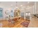 Bright, airy kitchen featuring modern appliances, custom cabinetry, and a charming dining area at 312 Hobcaw Dr, Mount Pleasant, SC 29464