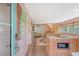 Open-concept living area showcases a modern kitchen, dining space, and cozy seating, filled with natural light at 312 Hobcaw Dr, Mount Pleasant, SC 29464