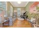 Sophisticated living room featuring a piano, comfortable seating, and natural light at 312 Hobcaw Dr, Mount Pleasant, SC 29464