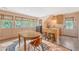 Inviting eat-in kitchen area with table, chairs, breakfast bar, and natural lighting from several windows at 312 Hobcaw Dr, Mount Pleasant, SC 29464