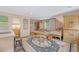 Spacious living area featuring a breakfast bar, a charming dining table, and a cozy seating area at 312 Hobcaw Dr, Mount Pleasant, SC 29464