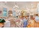 Open-concept living space features hardwood floors, natural light, and a modern kitchen at 312 Hobcaw Dr, Mount Pleasant, SC 29464