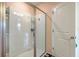 Modern bathroom featuring a glass door shower and a view of the bathroom doorway at 313 Lanyard St, Johns Island, SC 29455