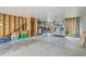 Large garage space showing concrete floor, partial framing and block walls, suitable for multiple uses at 313 Lanyard St, Johns Island, SC 29455