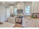 Well-equipped kitchen with stainless steel appliances, ample counter space, and white cabinets at 313 Lanyard St, Johns Island, SC 29455