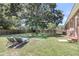 Spacious backyard with mature trees, providing a serene outdoor retreat for relaxation and enjoyment at 334 Water Oak Dr, Goose Creek, SC 29445