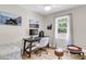 Bright bedroom with a large window, desk, and unique decor, ideal for work or relaxation at 334 Water Oak Dr, Goose Creek, SC 29445