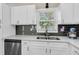 Updated kitchen featuring stainless steel appliances, white cabinets, and quartz countertops at 334 Water Oak Dr, Goose Creek, SC 29445