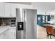 Kitchen featuring stainless steel refrigerator, white cabinets and quartz countertops at 334 Water Oak Dr, Goose Creek, SC 29445