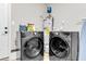 Efficient laundry area with modern machines and essential equipment, designed for convenience at 334 Water Oak Dr, Goose Creek, SC 29445