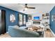 Contemporary living room featuring a fireplace, mounted TV, stylish decor, and comfortable seating at 334 Water Oak Dr, Goose Creek, SC 29445