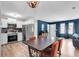 Bright, open-concept living room and kitchen featuring modern appliances and stylish design at 334 Water Oak Dr, Goose Creek, SC 29445