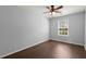 Cozy bedroom with hardwood floors, a window, and ceiling fan at 354 Iveson Rd, Summerville, SC 29486
