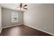 Bedroom with hardwood floors, a window, and ceiling fan at 354 Iveson Rd, Summerville, SC 29486