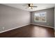 Bedroom with hardwood floors, a ceiling fan, and a window at 354 Iveson Rd, Summerville, SC 29486