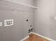 Laundry area with tile floor, washer/dryer hookups, and wire shelving at 354 Iveson Rd, Summerville, SC 29486