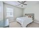 Comfortable bedroom with a window, ceiling fan, plush carpet, and neutral walls at 359 Whispering Breeze Ln, Summerville, SC 29486