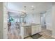 Spacious kitchen island featuring a stainless steel dishwasher and a modern faucet at 359 Whispering Breeze Ln, Summerville, SC 29486