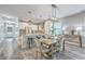Charming eat-in kitchen with stainless steel appliances, granite countertops and a breakfast bar at 359 Whispering Breeze Ln, Summerville, SC 29486
