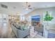 Spacious, open-concept living area with access to the dining and kitchen, featuring modern decor at 359 Whispering Breeze Ln, Summerville, SC 29486